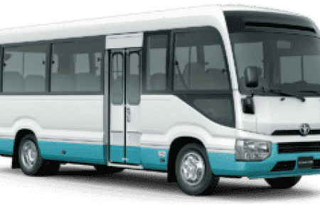 White and teal passenger bus side view