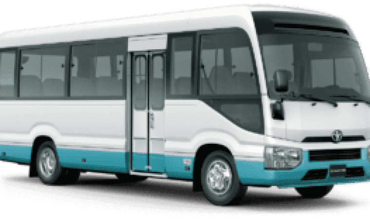 White and teal passenger bus side view